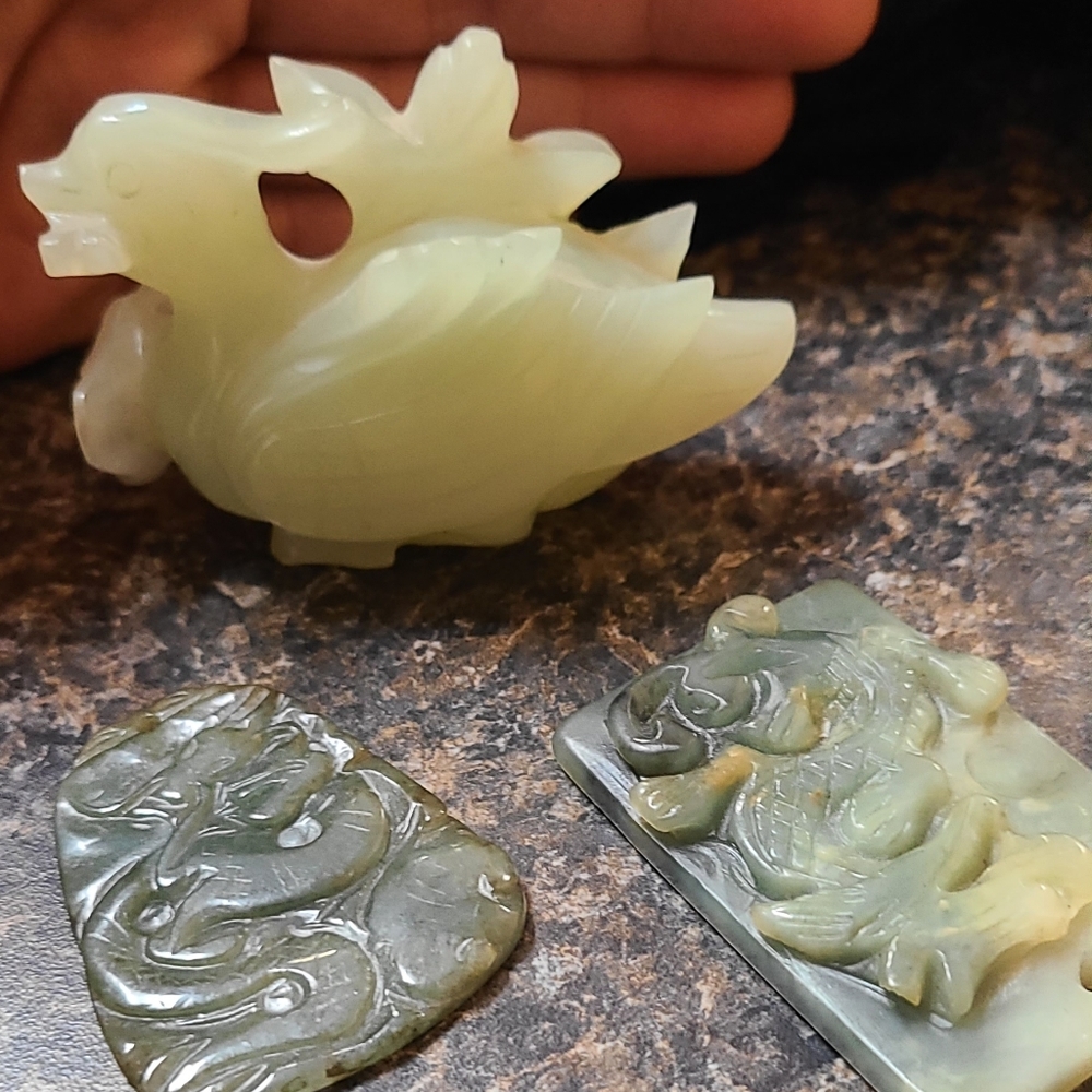 Jade stone statue and pendants